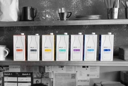 Different types of milk for coffee - whole milk oat milk almond milk comparison for specialty coffee brewing