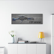 F89 Minimi rifle artwork on a wall above a white cabinet with decor items.