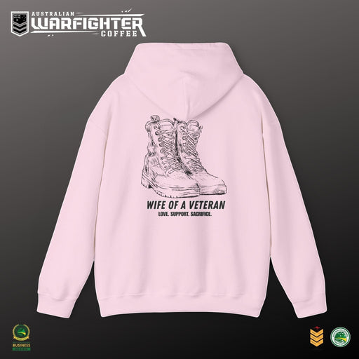Australian Warfighters Coffee pale pink cotton-poly blend hoodie with a graphic of combat boots and text "Wife of a Veteran — Love. Support. Sacrifice."